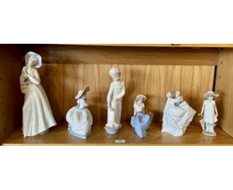 A collection of six porcelain Nao figurines, tallest 30cm. (6)