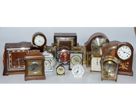 A collection of early 20th century and later clocks, to include mantel, carriage, traveling alarm and others, having manual w
