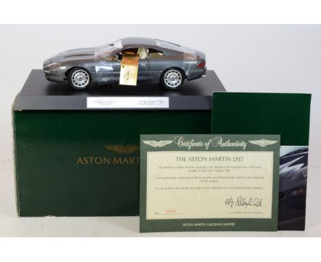 A diecast model Aston Martin DB7 by Guillow, endorsed by Aston Martin Lagonda Ltd, 1:18 scale, Ltd edition No 4948, boxed wit