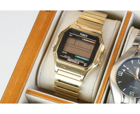 A collection of gents watches within display box to include Timex, Sekonda, Roamer, Avia and Ingersoll examples. 
