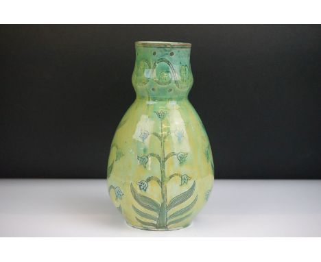 Della Robbia Pottery (Birkenhead 1894-1906) Bulb shaped Vase with incised flower decoration in shades of green and blue, inci