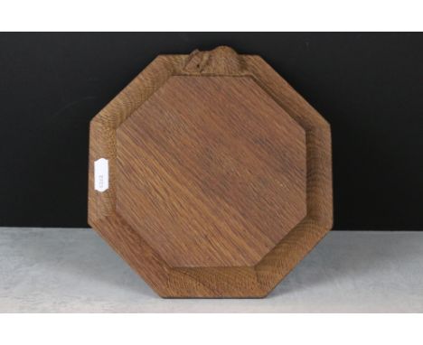 In the manner of Mouseman, Carved Oak Octagonal Cheese Board with mouse carved to side, 19cm wide 