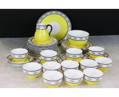 Early 20th century Royal Worcester Black and Yellow part Tea Service comprising Milk Jug, Sugar Bowl, 12 Tea Cups, 12 Saucers