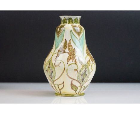 Della Robbia Pottery (Birkenhead 1894-1906) Lozenge shaped Vase with painted leaf and flower decoration in shades of green, b