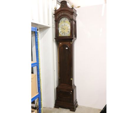 George III Mahogany Longcase Clock, three winding holes, the arched face with moon-phase, brass dial with silver chapter ring