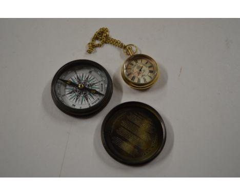 A brass cased compass and pocket watch