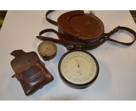 A brass cased pocket barometer by Baker of London, contained in leather case; together with an E.R.Watts &amp; Son surveying 