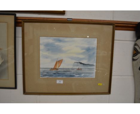 A framed and glazed watercolour seascape depicting a sailing boat 