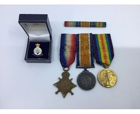 WWI Campaign medal trio and ribbon bar, Corporal E. Richardson, service number R-4777, Kings Royal Rifles Corp and an enamel 