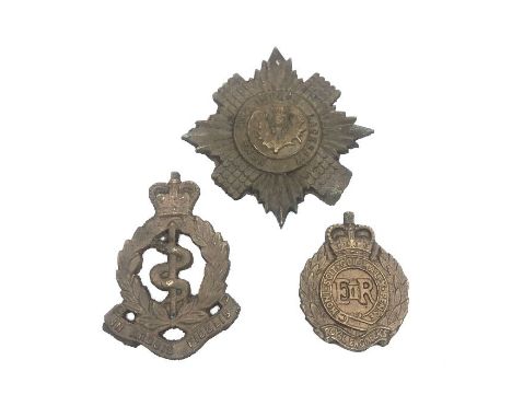 Three cast metal regimental insignia's, comprising:- the Scots Guards, the Royal Army Medical Corps and the Royal Engineers (