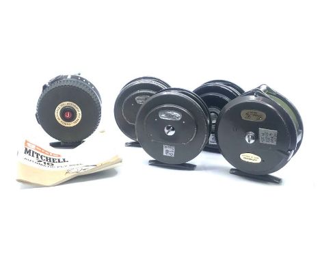 Angling interest; a Garcia 'Mitchell 710' automatic fly reel with instruction manual; and four Intrepid fly reels (5)&nbsp;