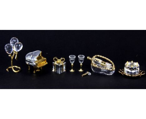Five boxed Swarovski Crystal Memories of a piano, present, bunch of balloons, champagne set and cake &amp; stand, tallest