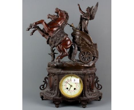 A large 19th Century French bronzed spelter mantle clock, H. 55cm (A/F).