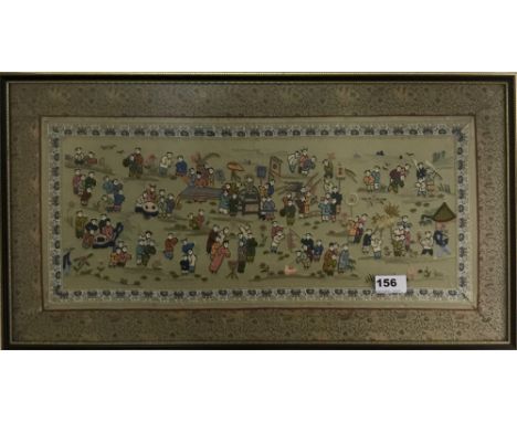 A framed embroidered Chinese framed silk panel of a hundred children, 64 x 34cm.