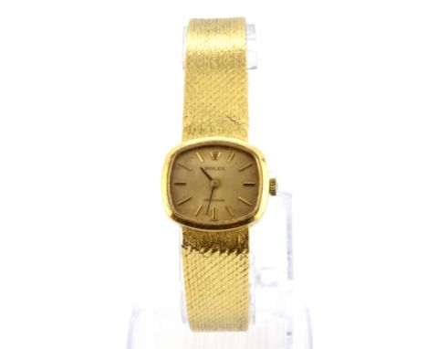 A vintage lady's Rolex 18ct yellow gold wrist watch.Weight 49.8g.