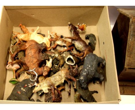 A hand made wooden toy ark and a quantity of vintage elastolin animal figures.