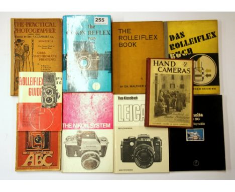 A quantity of vintage camera manuals.