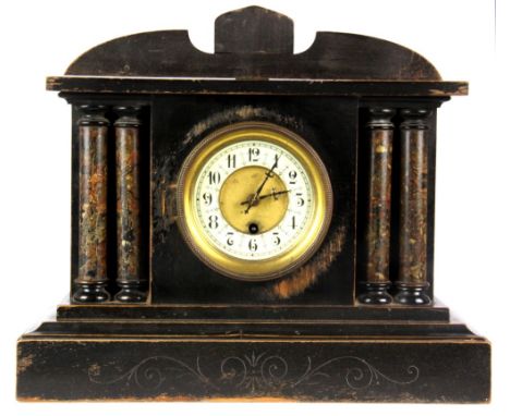 A 19th Century wooden mantle clock, H. 31cm.