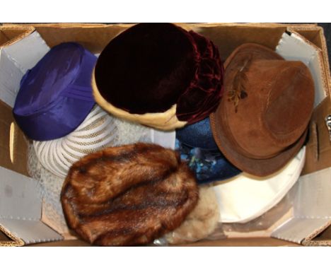 A quantity of vintage lady's hats.