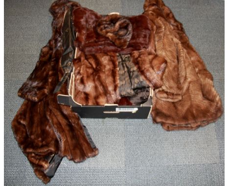 A quantity of vintage fur coats and jackets.