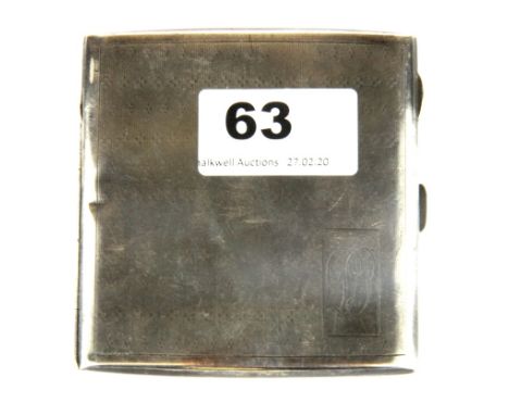 A hallmarked silver cigarette case with engine turned decoration, W. 8cm.