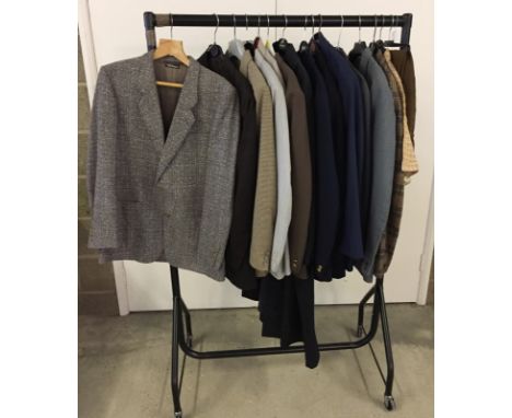 A quantity of vintage menswear clothing. To include Jackets, 3 piece suits and raincoat. Various sizes 36 - 42 " chest