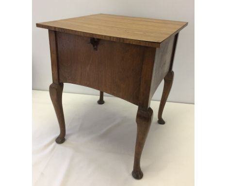Vintage wooden sewing box on cabriole legs. With Formica covered top and contents including thread, needles, braid etc. Measu