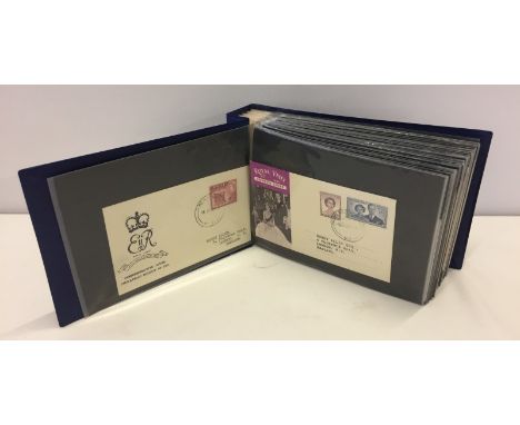 An album containing approx 100 First Day Covers and stamped envelopes. Dates from 1930's onwards. 