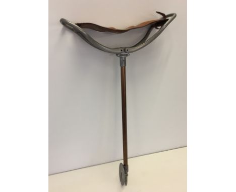 A vintage shooting stick by Featherwate with leather seat.  