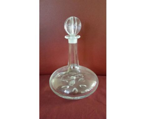 An Orrefors crystal glass ships decanter signed Nils Landberg. Has a map of Bermuda and a galleon etched to front. Signed on 