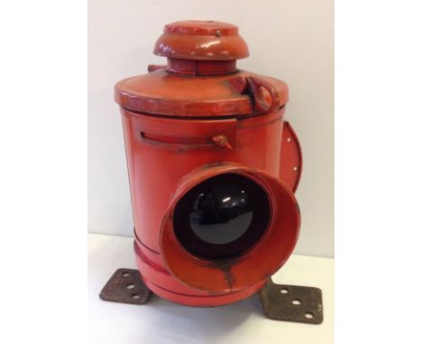 A vintage ship's red port signal lamp.  43cm tall