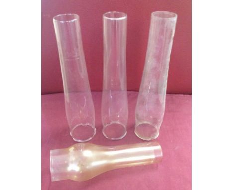 4 vintage glass oil lamp chimneys, 3 'Aladdin' heat resistant and one un-named  
