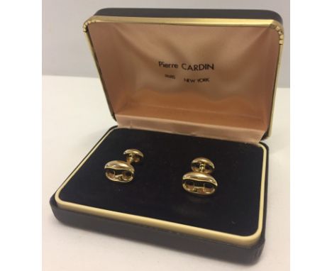 A boxed set of Pierre Cardin cufflinks  
