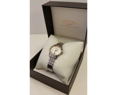 A ladies Rotary watch with box. Stainless steel bracelet, crystal set face with date function. Working order. 