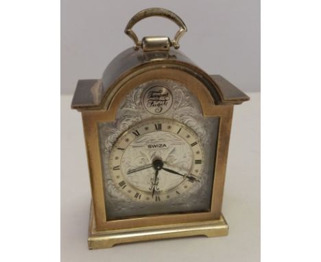 A small Tempus Fugit Swiss made carriage clock. In working order. 