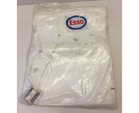 A pair of vintage Esso overalls with embroidered badge. Overalls in original packaging. Label says 46