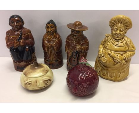 A box of Sylvac ceramic face pots and character containers.  