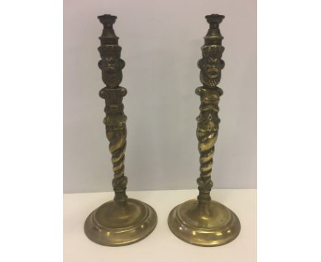 A pair of heavy brass table lamp bases. With ethnic/tribal decoration. 