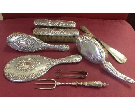 A collection of vintage silver items. To include a dressing table set 