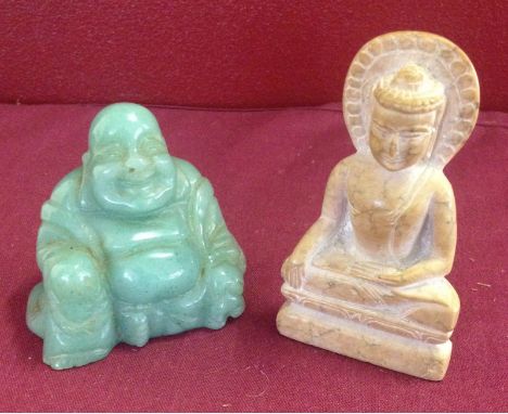 A carved jade Buddha together with a carved soapstone deity  Buddha 5cm tall, deity 7cm tall
