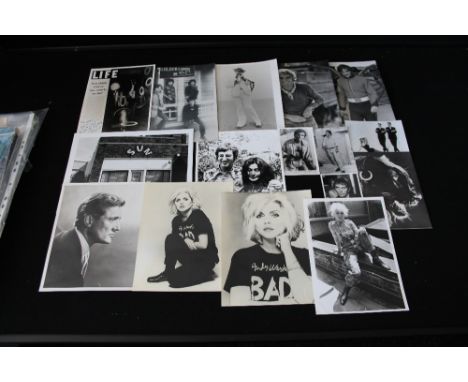 PHOTOGRAPHS AND MEMORABILIA - a diverse range of bands and musicians photographs and memorabilia to include a Rolling Stones 