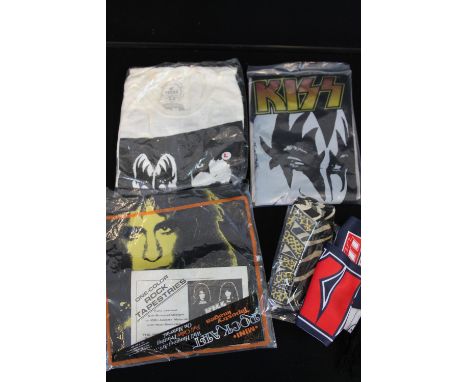 KISS - a selection of rare Kiss clothing to include 'The Cook' apron, a fur patterned scarf, a Lick It Up scarf, a large t-sh