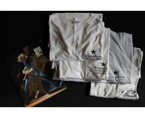 BRYAN ADAMS - 2004 TOUR - items to include a 92 Tour programme, 2 white local crew T-shirts (XL) and 2 grey, 1 local crew & 1