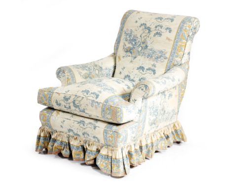 A late Victorian easy armchair, upholstered with peacocks and pines material by Warner &amp; Sons, on square tapering walnut 