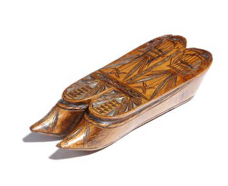 A 19th century treen chip carved double shoe snuff box, the sliding cover decorated with a pair of urns of flowers and leaves
