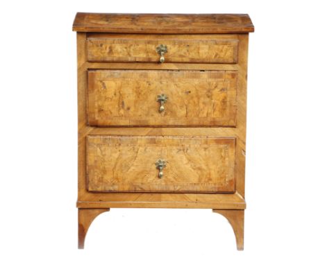 An Italian walnut chest, with burr veneered panels and fitted with three drawers, on bracket feet, late 18th / early 19th cen