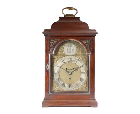 A mahogany bracket clock, the later eight day brass movement with a verge escapement, with an arched brass dial, with a silve