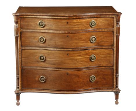 A George III mahogany serpentine chest in the manner of Chippendale and Haig, the crossbanded top inlaid with stringing and w