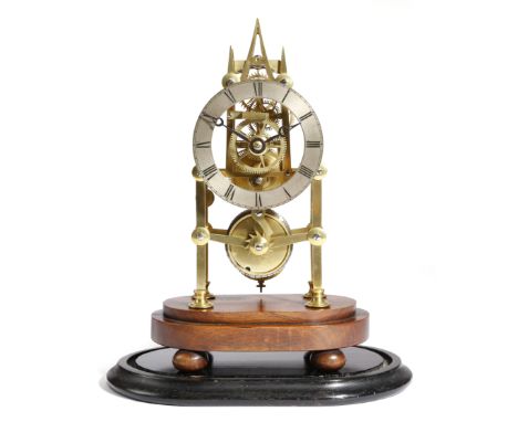 λ&nbsp;A Victorian brass skeleton clock, the single fusee movement with six turned pillars and an anchor escapement, the silv