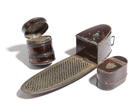 Three rare japanned tole nutmeg graters, one of navette shape, one cylindrical and the other oblong, each with a compartment 